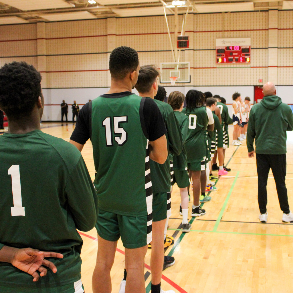 Team lines up for the National Anthem