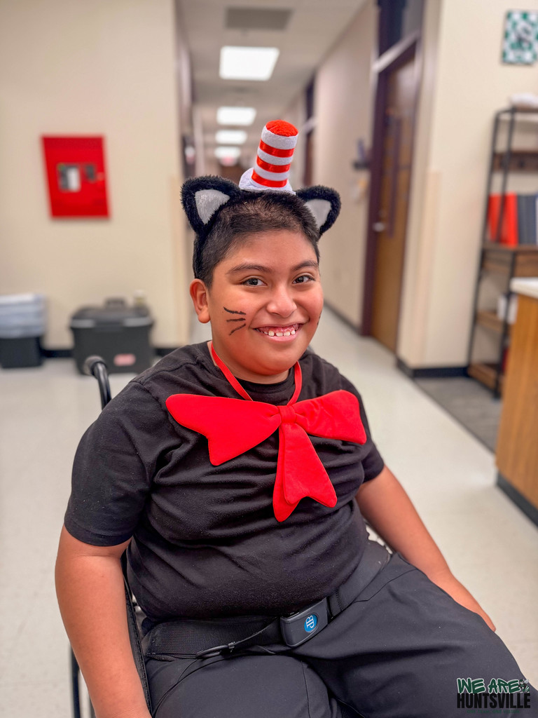 adorable kid dressed up as cat in the hat