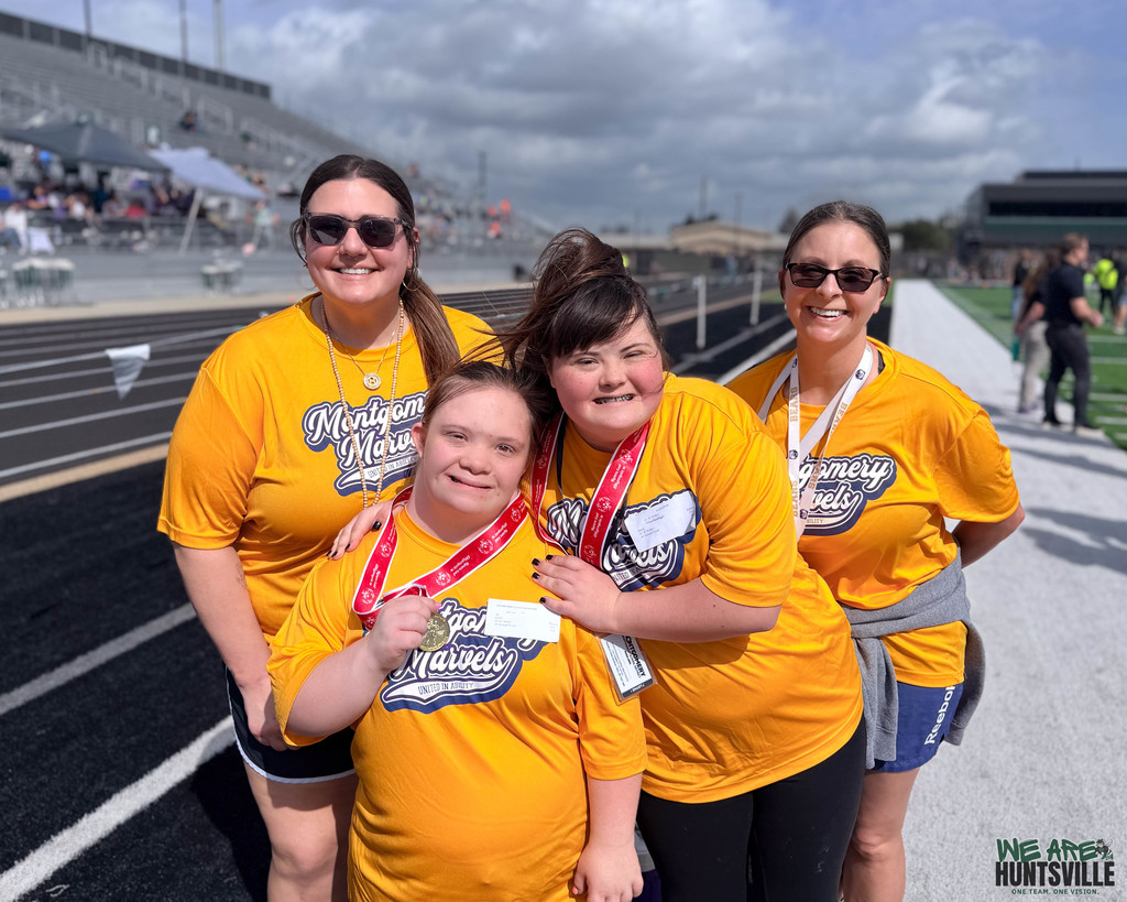 Cute foursome of athletes