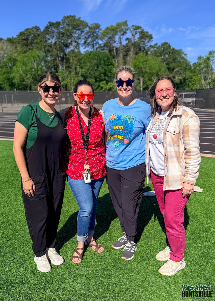 Cute foursome of teachers with star sunglasses