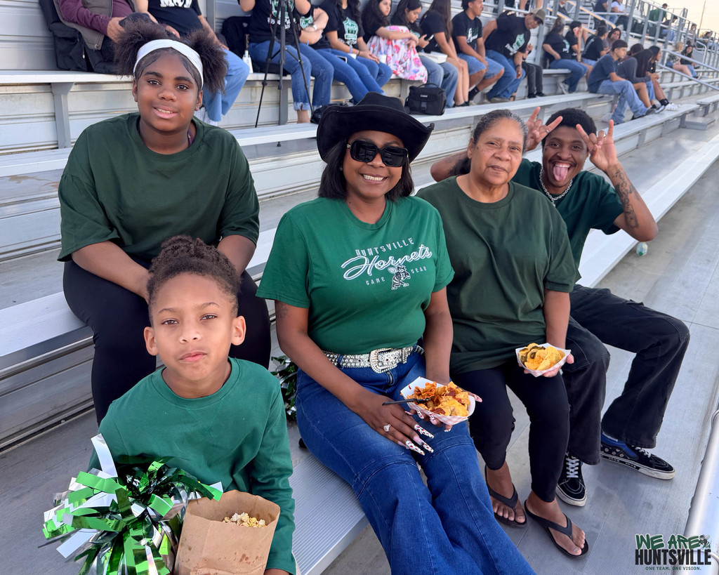 family with cowboy hat lady