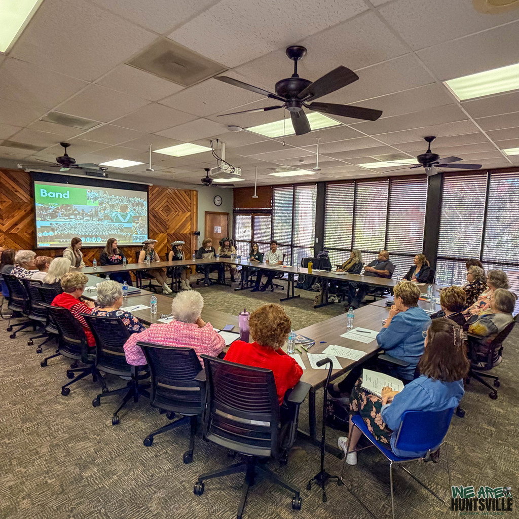 Wide shot- students presenting