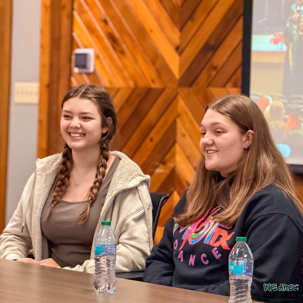 students listening and laughing