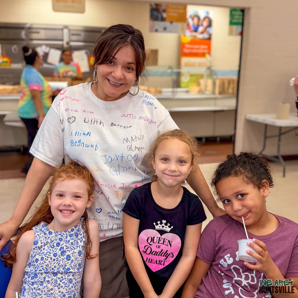 A teacher with her students
