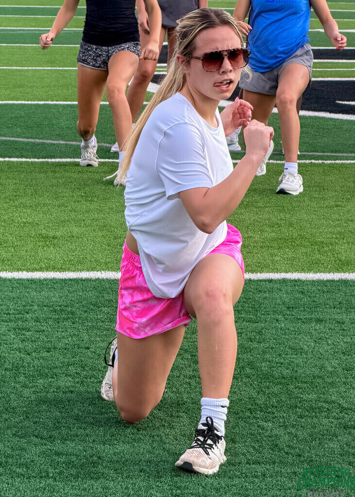 Girl stretching with tongue out