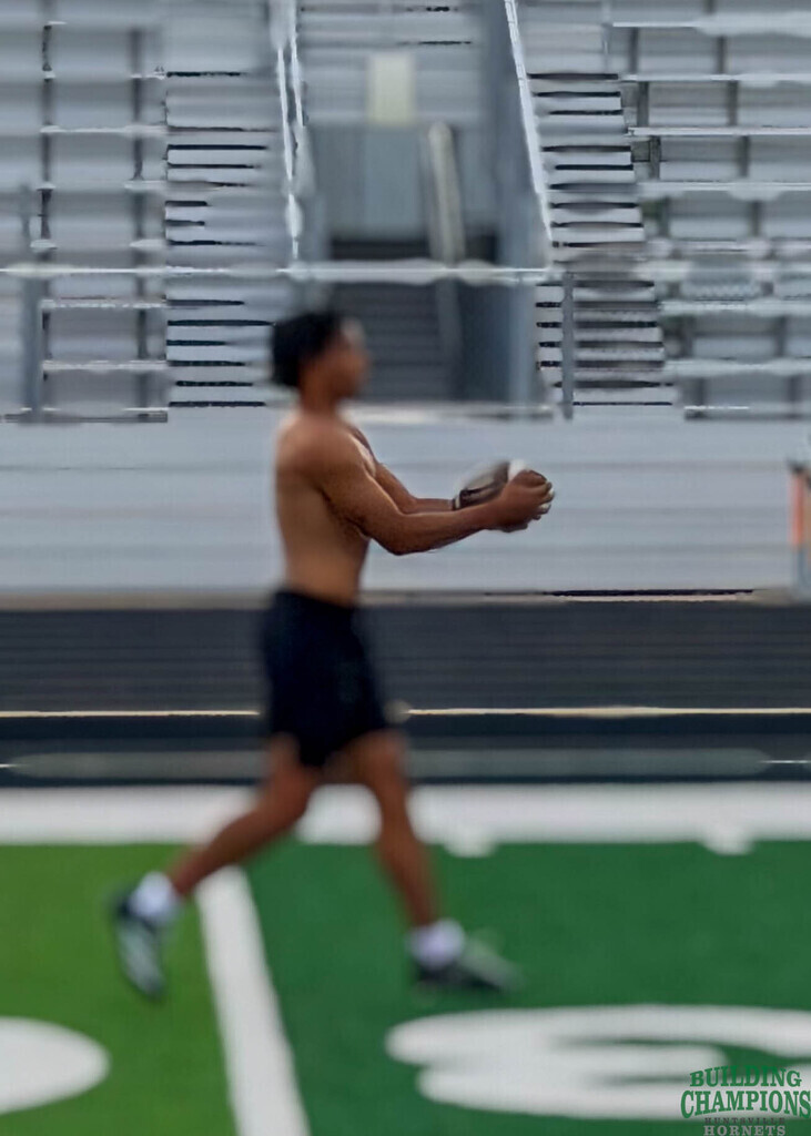 Artistic photo of kid catching ball