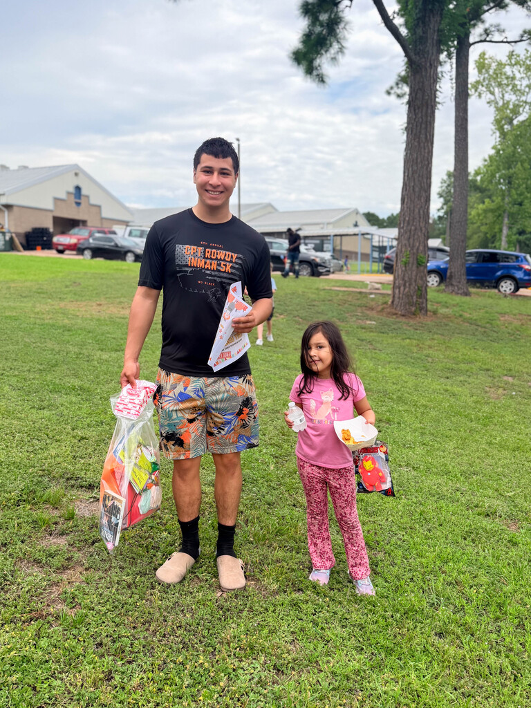 Dad and child with supplies