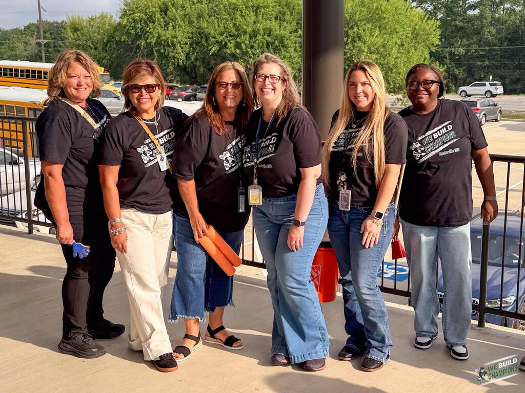 A group of teachers outside of the venue