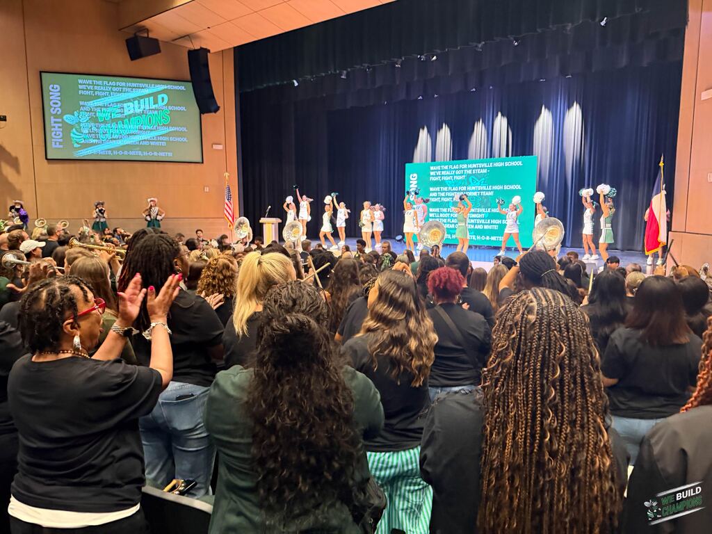 Cheer team performing on stage