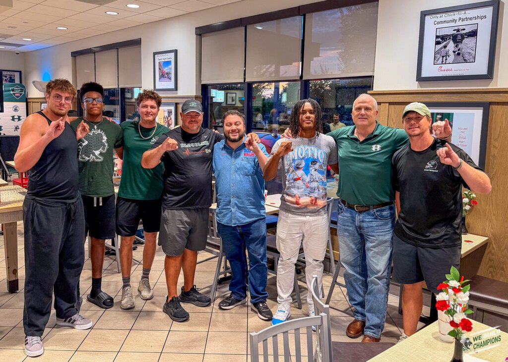 Players and Coaches at chick fil a show