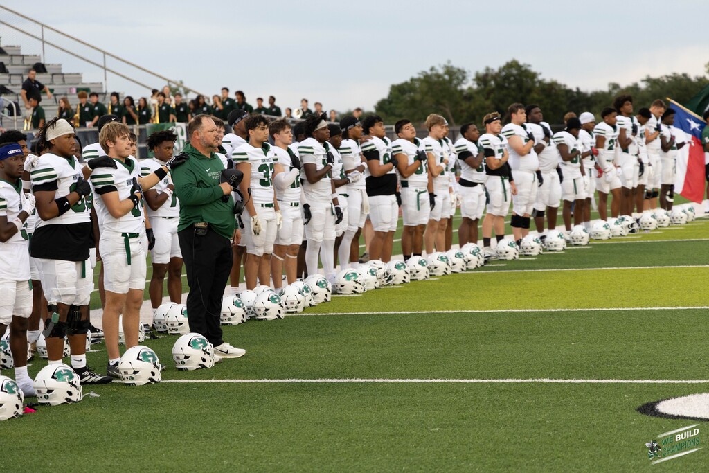 coach and players before the game