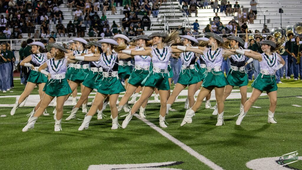 GG's performing at half time- moving as one.