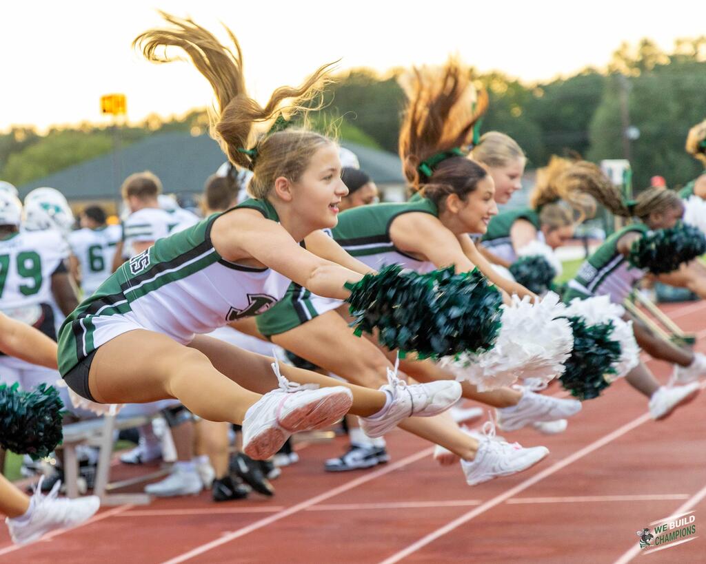 Cheer team pulling an amazing stunt