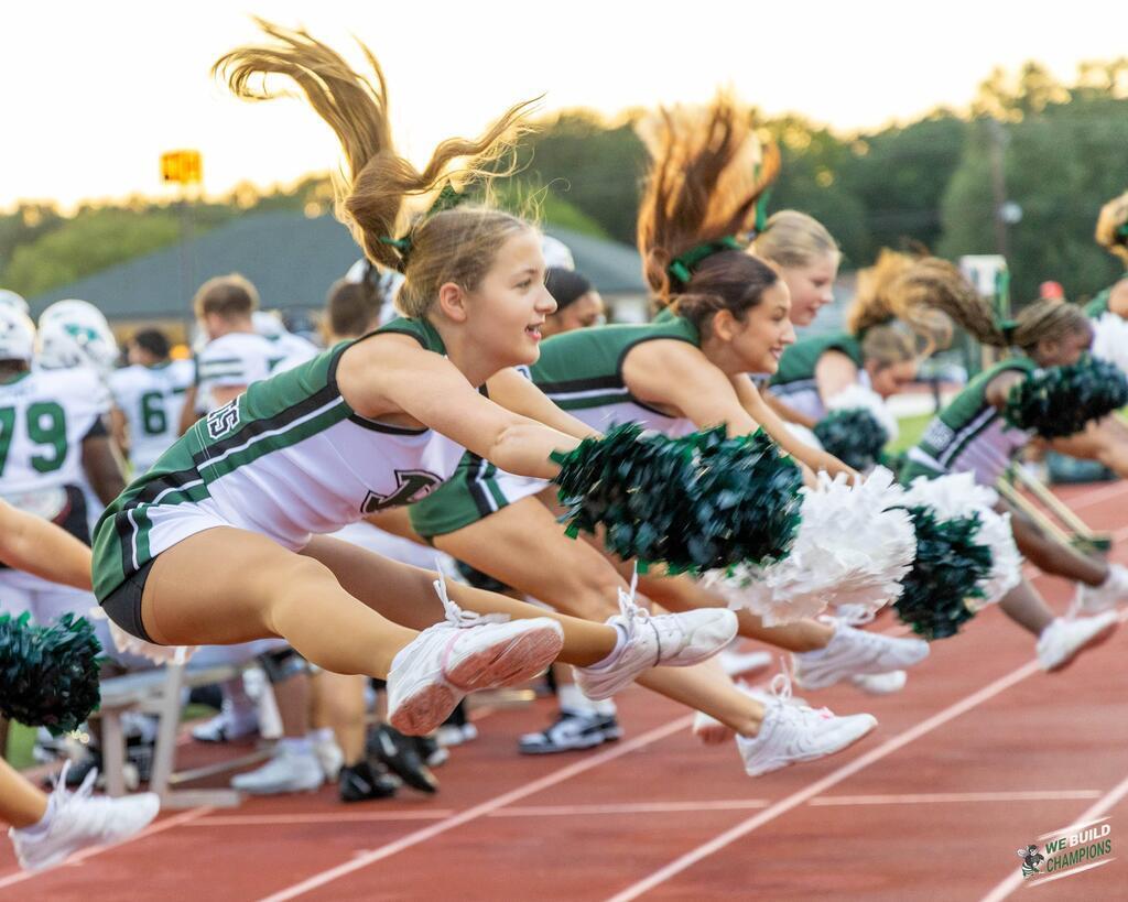 Cheer team pulling an amazing stunt