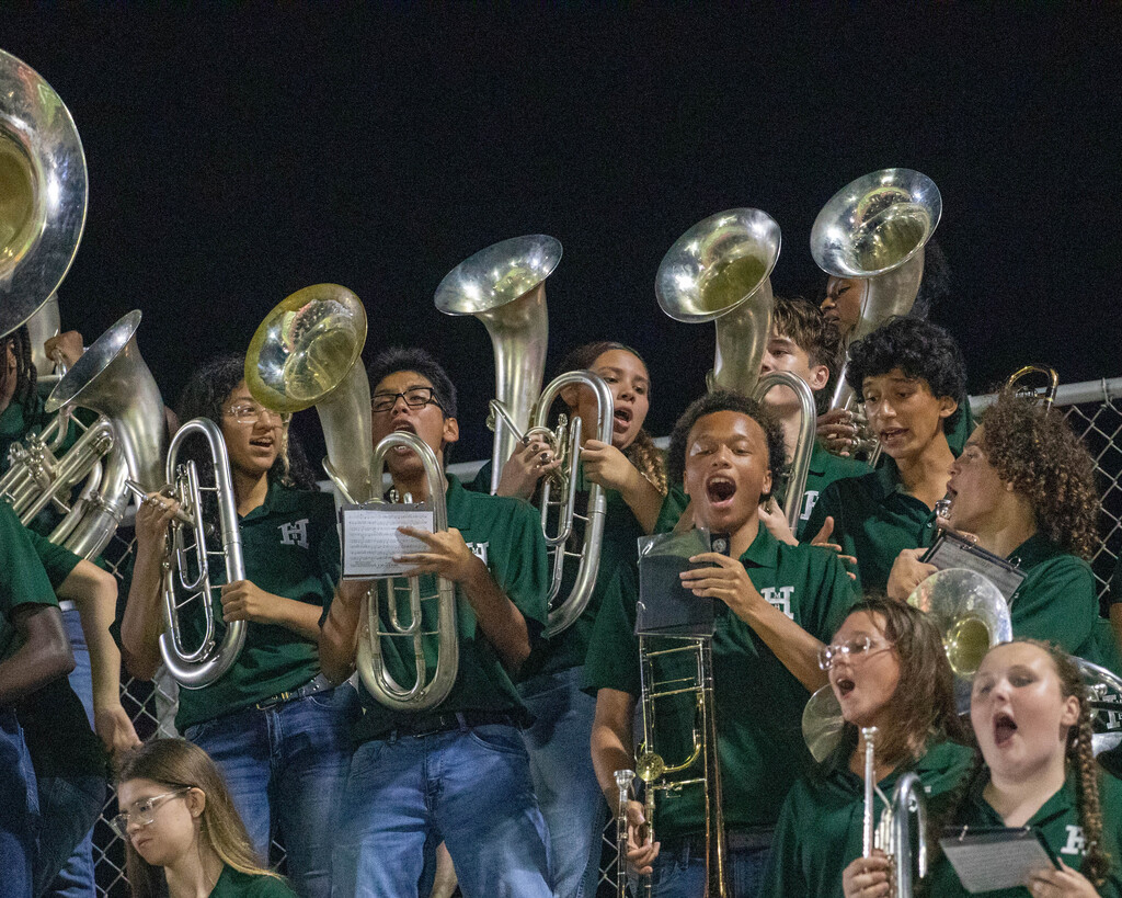 band cheers and plays