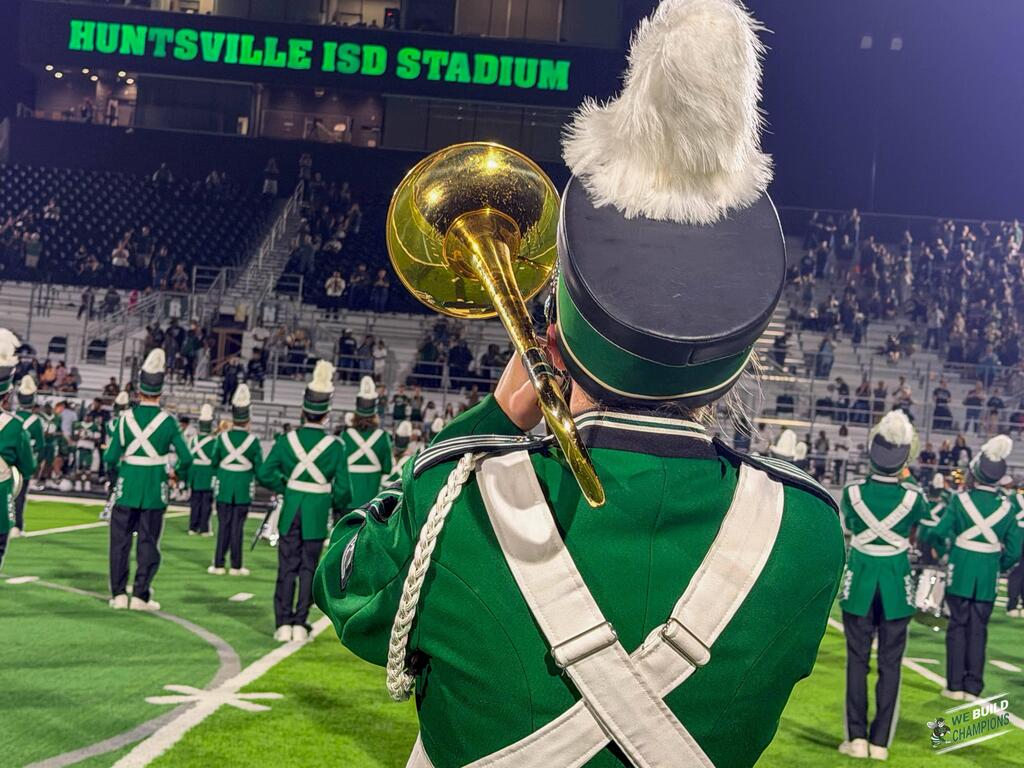tight shot of horn player