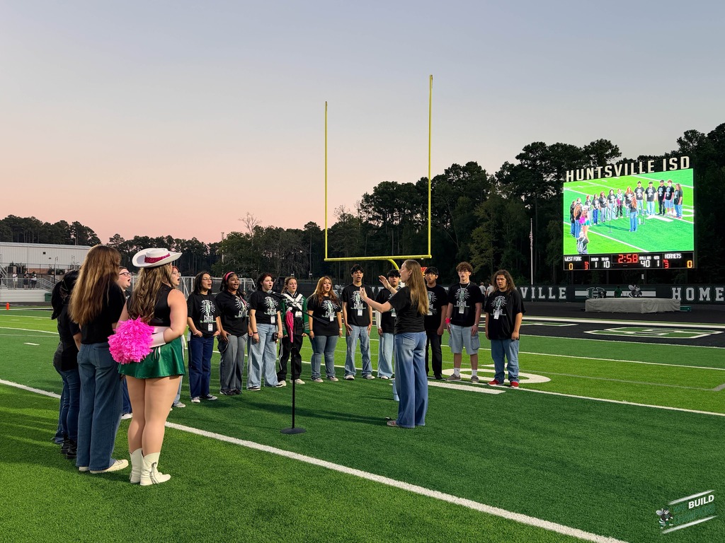 Choir sings on the field