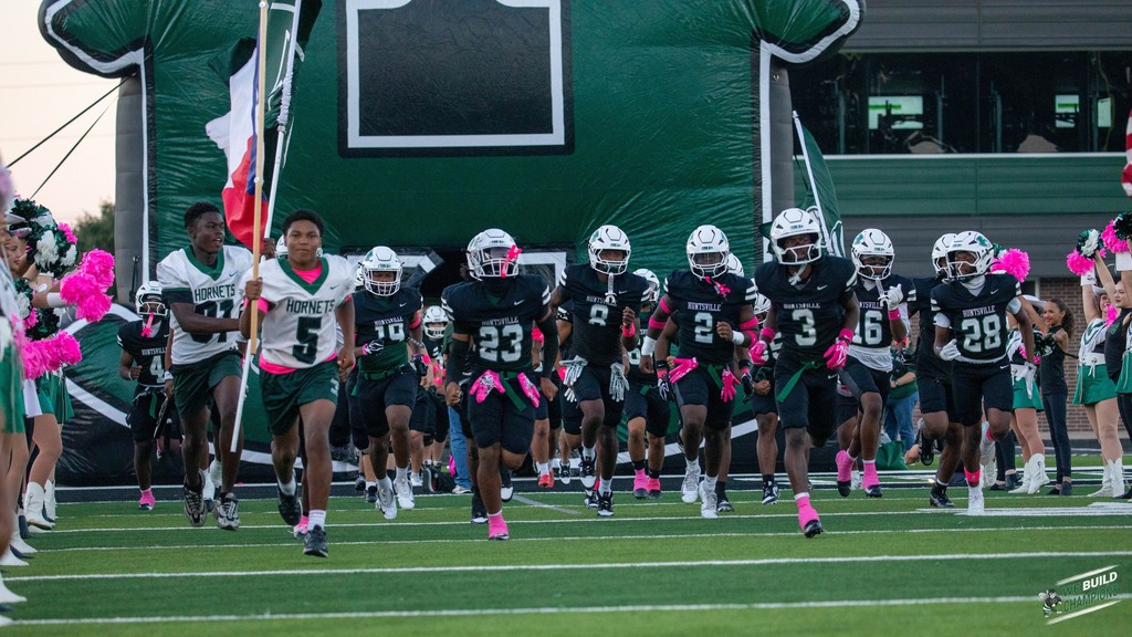 coming out of the tunnel- the team and flag men