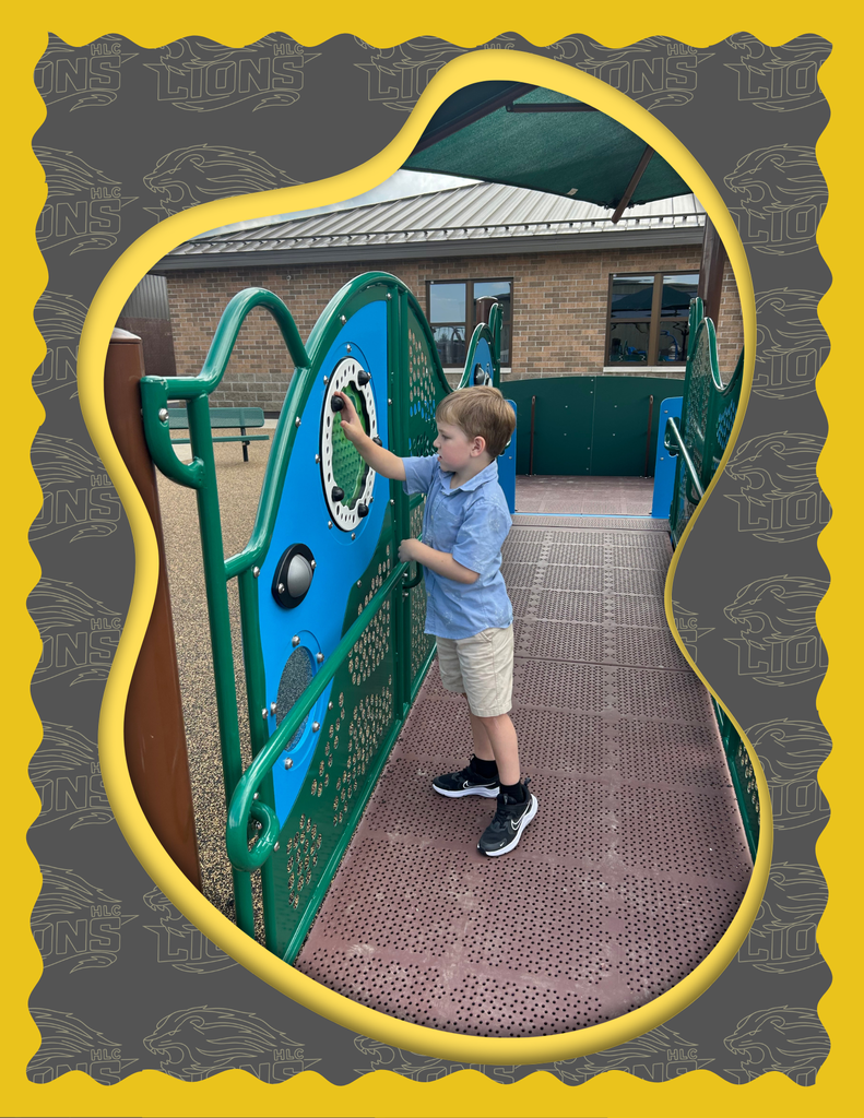 Student access new playground equipment.