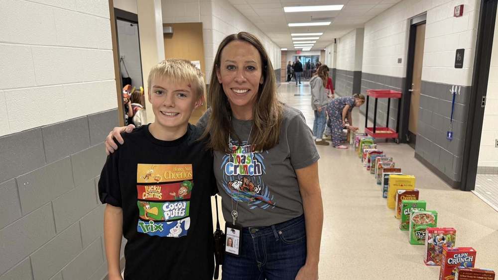 Cam Gilbert and Mrs Stevens getting ready for cereal drop.