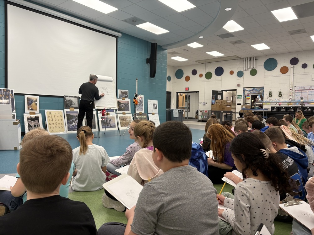 Illustrator/Reader Michael Glen Monroe demonstrating how to draw