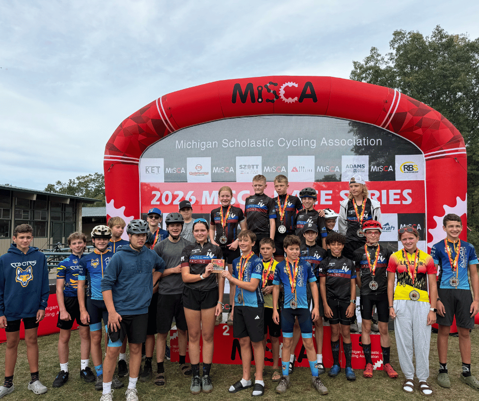 Huron Valley United Racing in a photo celebrating their first place win on the podium
