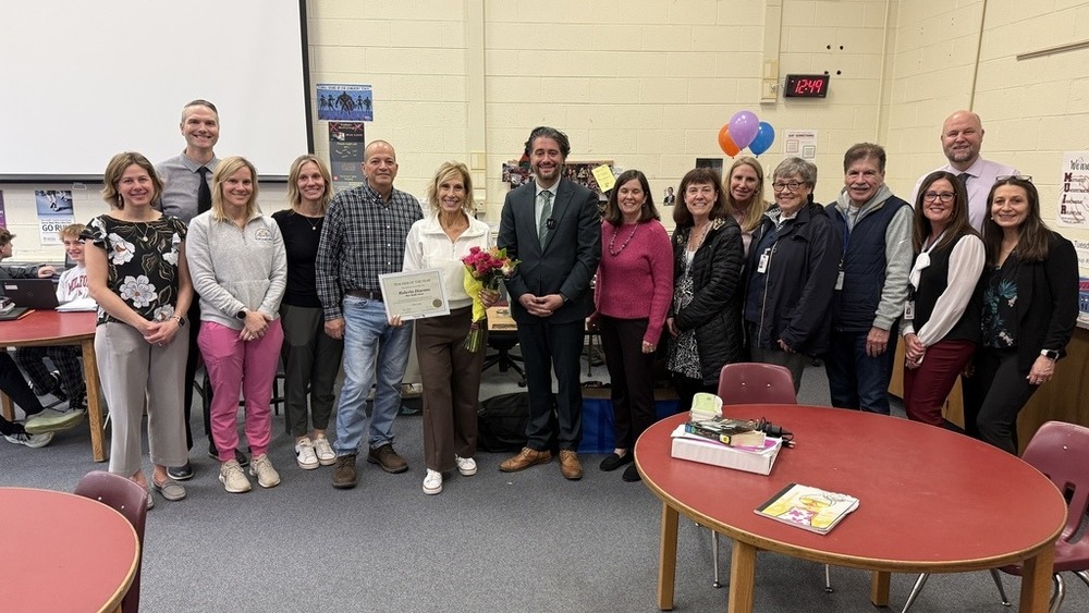 group photo of middle school teacher of the year award announcement