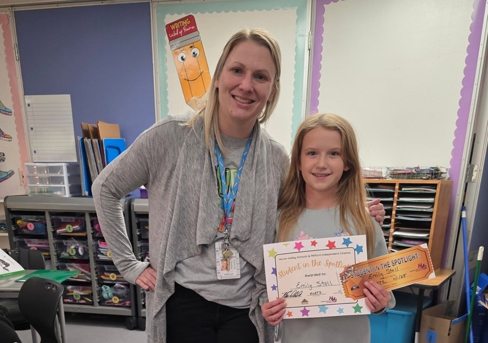 Student in the Spotlight with her teacher