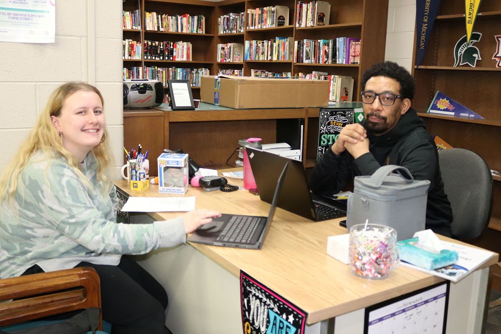 Doc works with an HHS student
