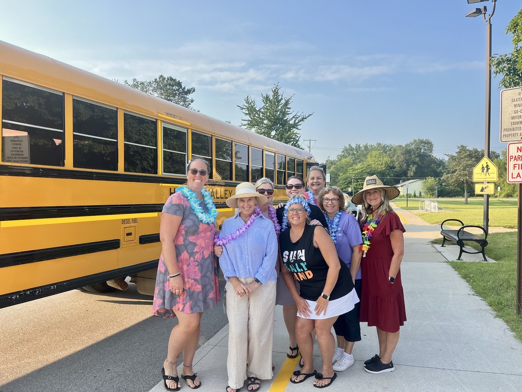 Elementary Teachers from Heritage wearing beach themed outfits