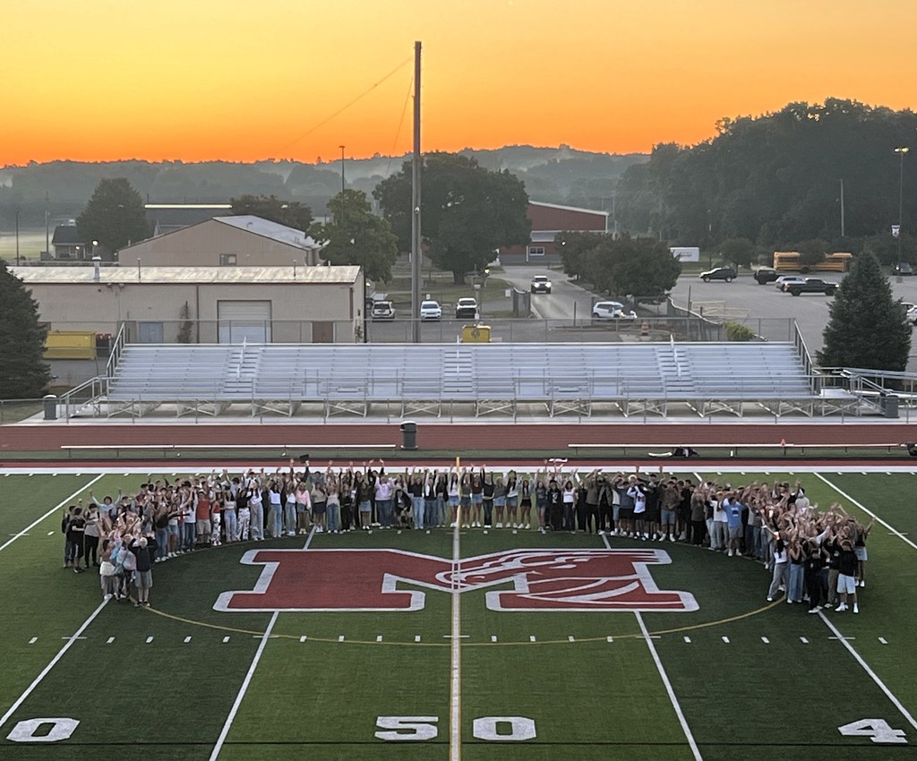 Senior Sunrise on the football field.