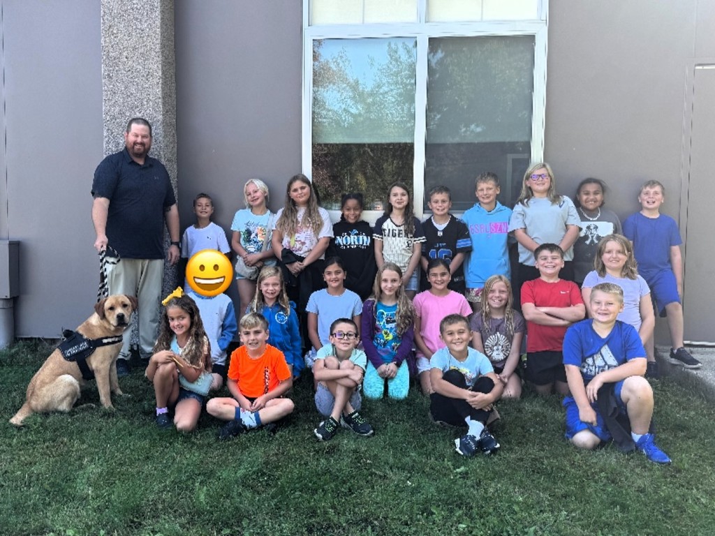 Spring Mills' new Therapy Dog in training paid a visit to the school