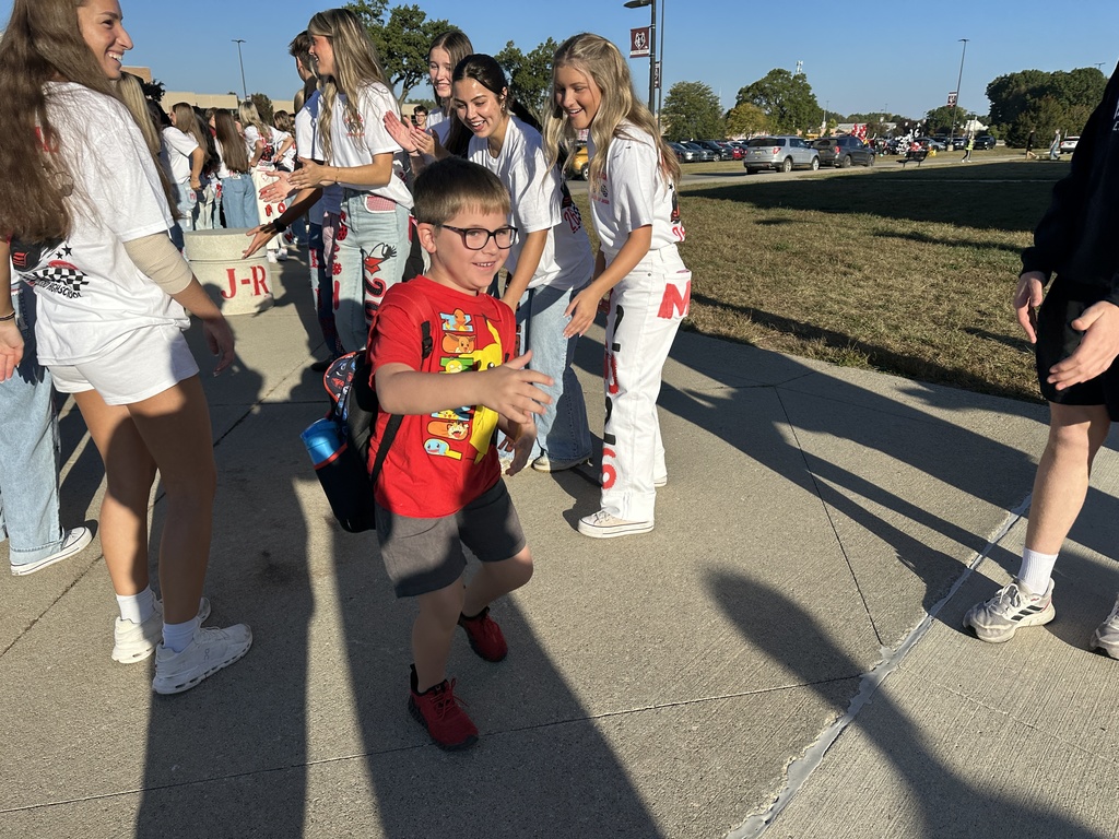 Heritage students being welcomed to school by Milford Students for Hoco2025