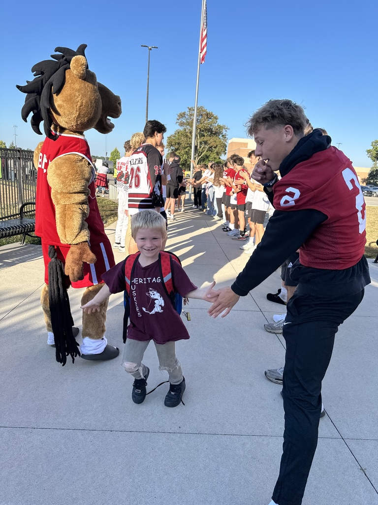Heritage students being welcomed to school by Milford Students for Hoco2025