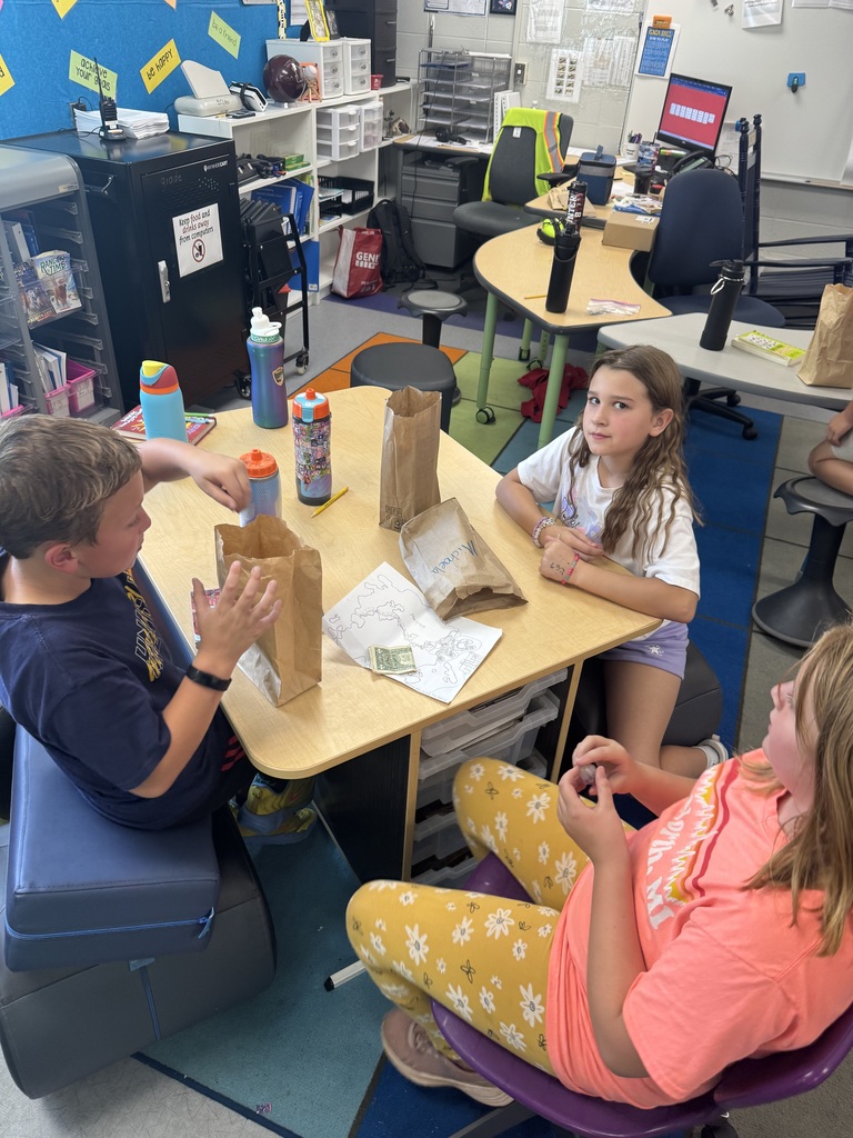 Students looking at artifacts