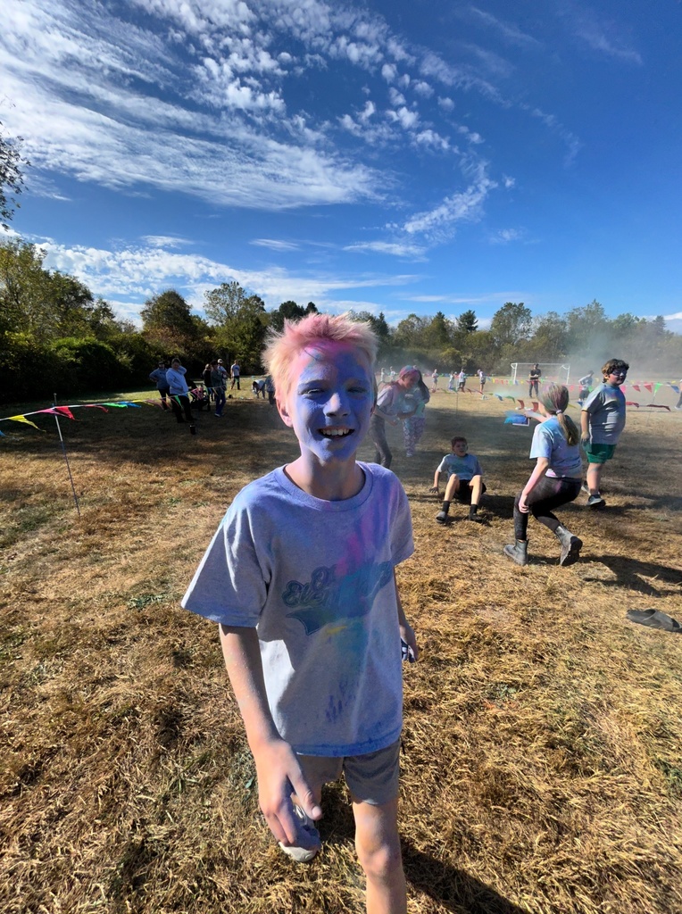 Student at Fun Run with blue face