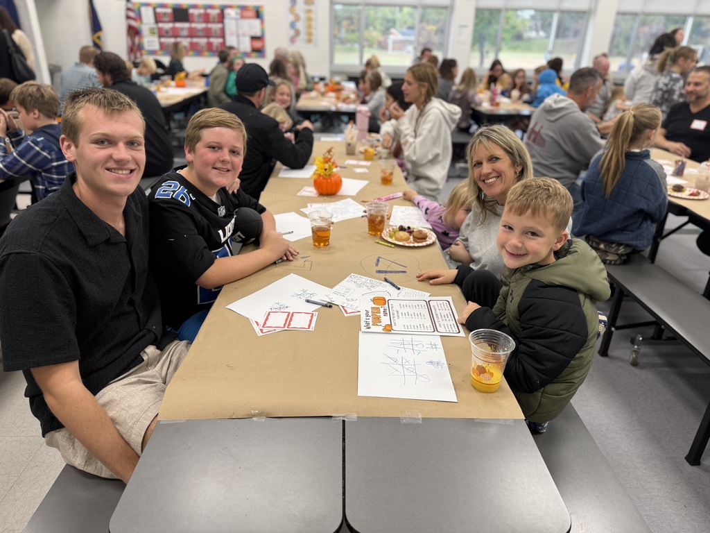 Families eating at Breakfast with a Buddy