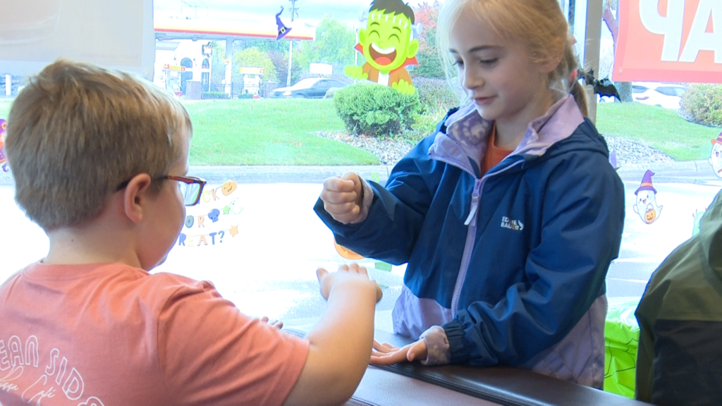 Photo of students at McDonald's event  - teachers  serve up your favorite while raising funds for Lakewood school!