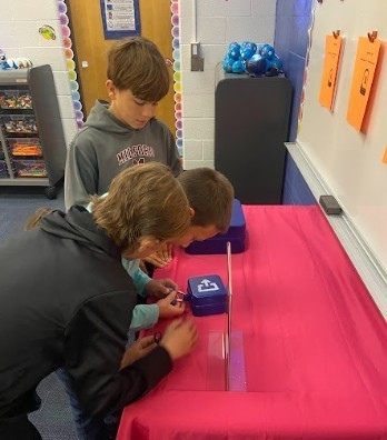 Students worked together to find the code to open Breakout Edu Boxes.