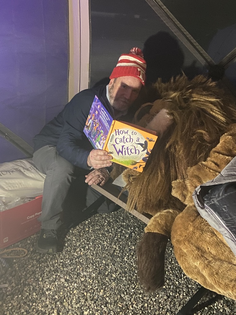 Oakley and Mr. Hamilton are ready for bed after a long day on the roof!