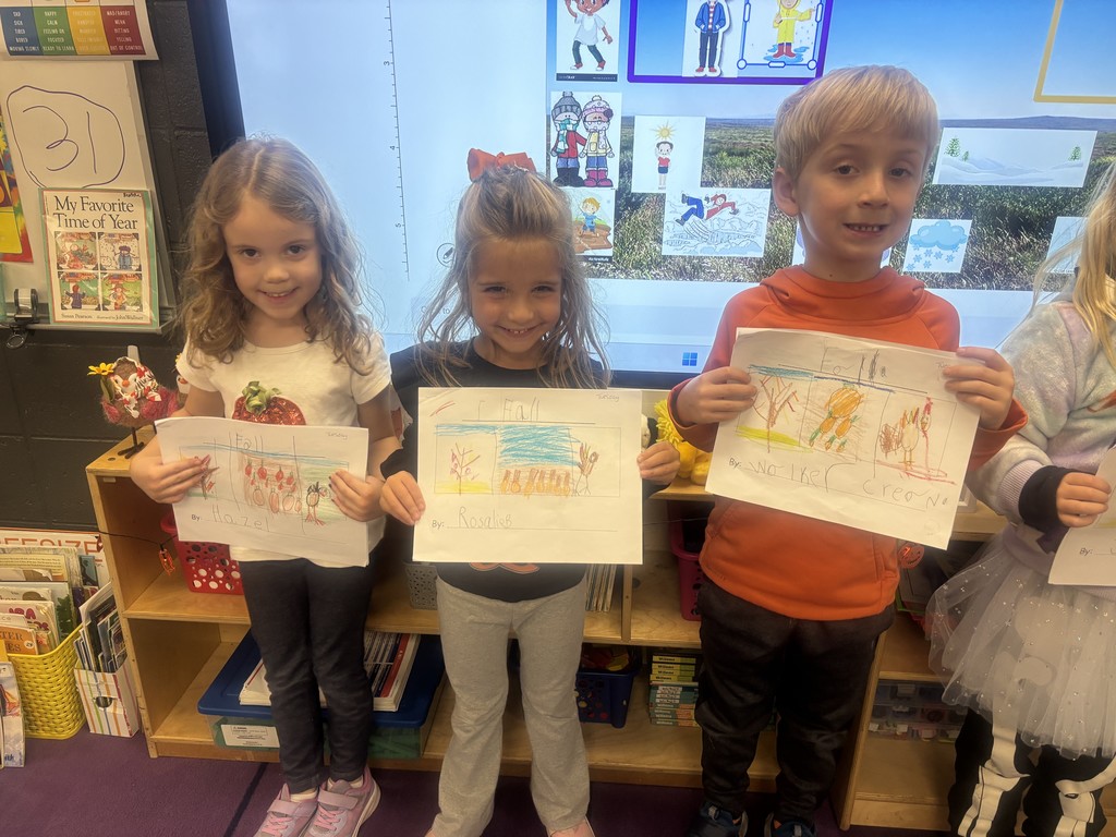 kindergarteners with their first books