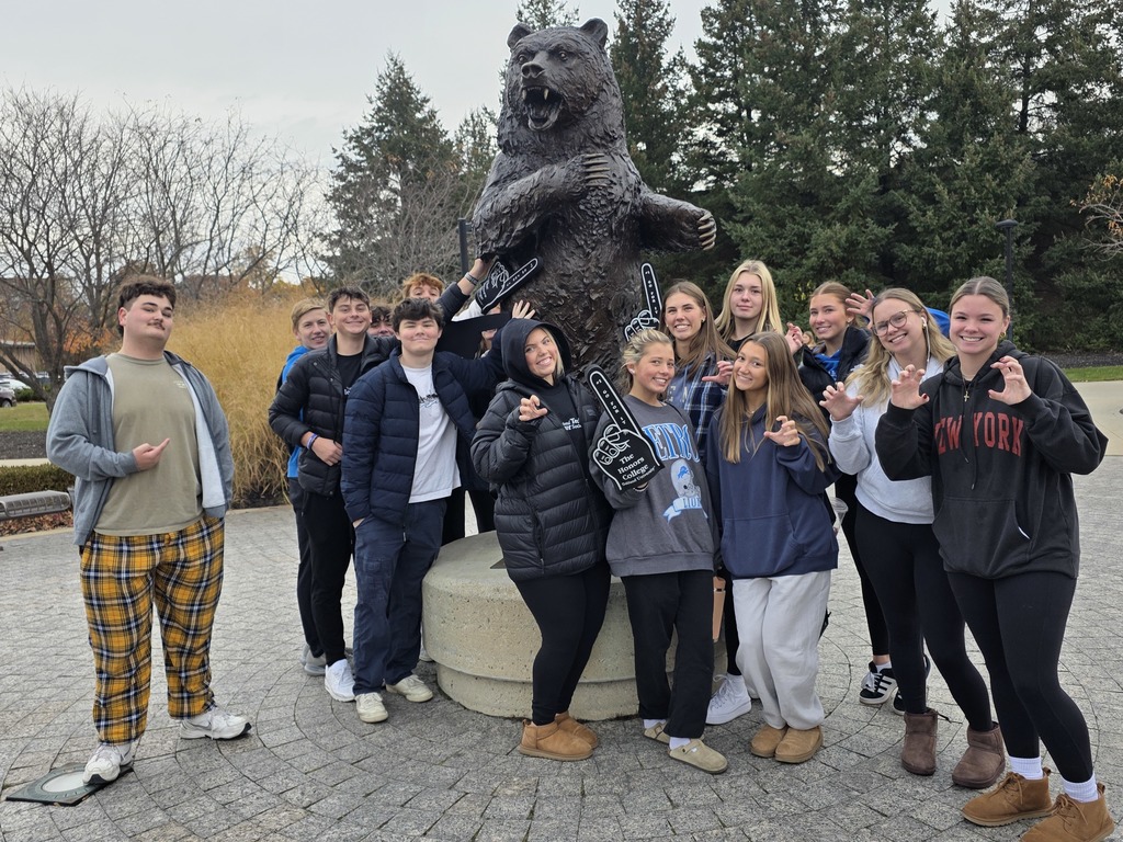group of students by the OU bear