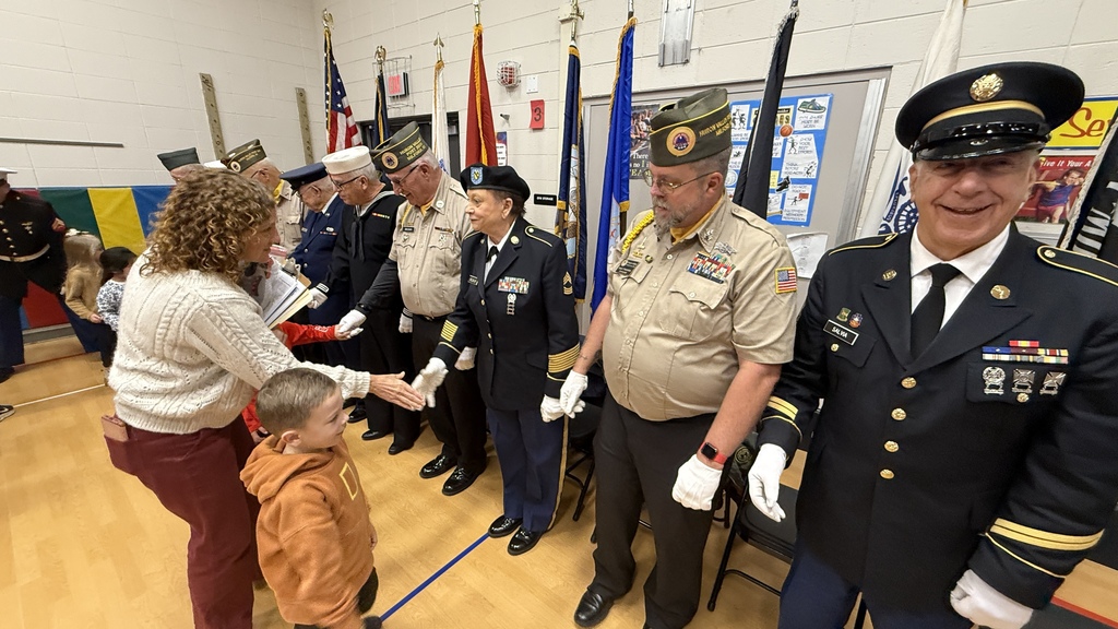 Veterans & students at veterans day assembly