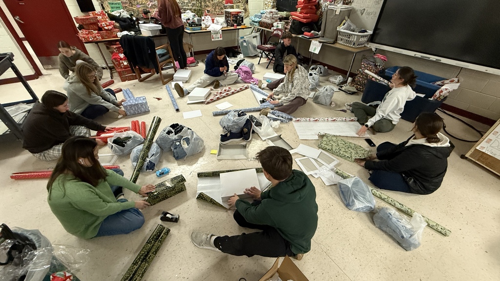 Students wrapping gifts for 'Milford Miracles'