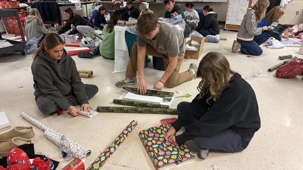 Students wrapping gifts for 'Milford Miracles'