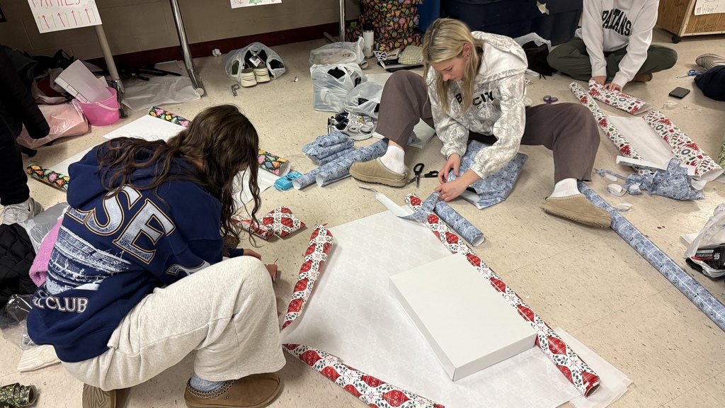 Students wrapping gifts for 'Milford Miracles'