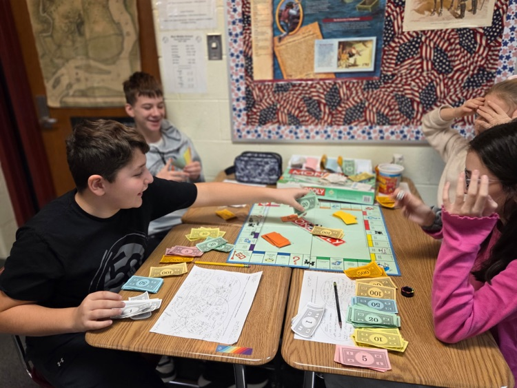 On Friday, Mr. Donoghue's 6th grade Social Studies students learned about different types economic systems through playing Monopoly. #wearemuir