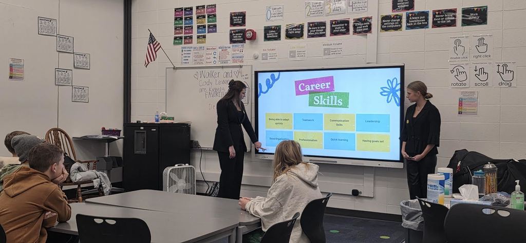 DECA students visit elementary classroom
