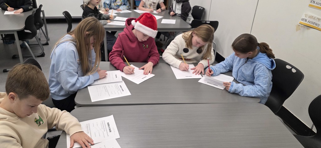 DECA students visit elementary classroom