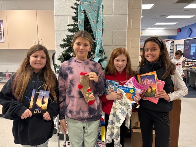 Our students donated pajamas and books to our local Community Sharing.